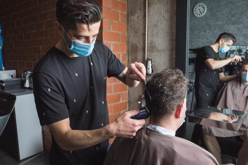 barber wearing face mask