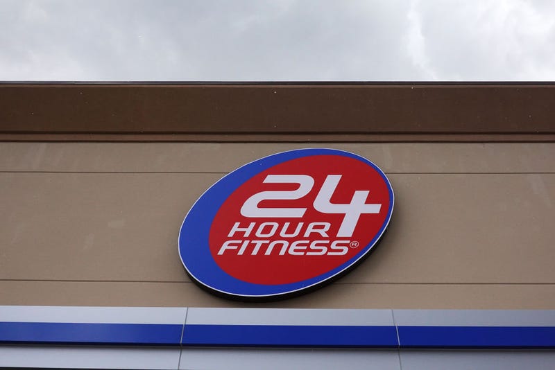 A sign is seen on the outside of a 24 Hour Fitness gym on June 15, 2020 in Miami, Florida.