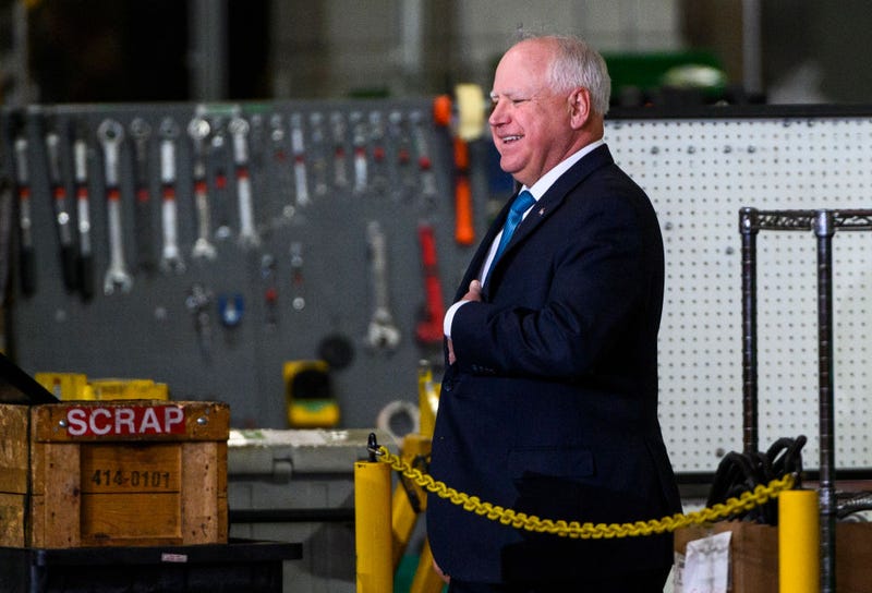 Minnesota Governor Tim Walz arrives during a visit by U.S. President Joe Biden to the Cummins Power Generation facility on April 3, 2023 in Fridley, Minnesota. 