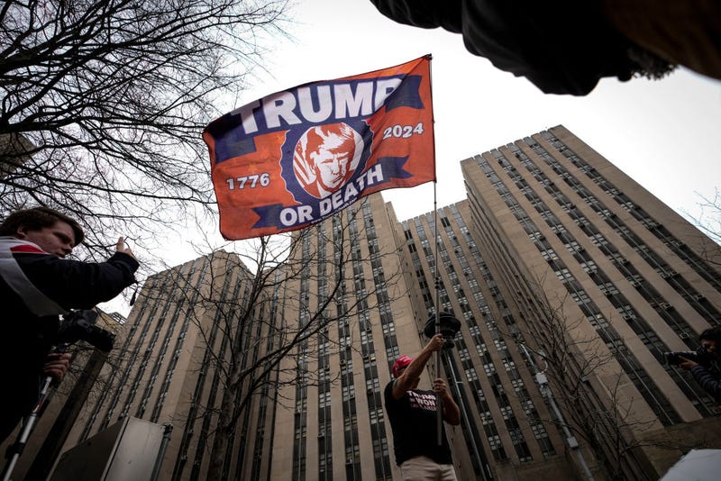Supporters of former U.S. President Donald Trump gather outside the courthouse where Trump will have his arraignment on April 4, 2023 in New York City.
