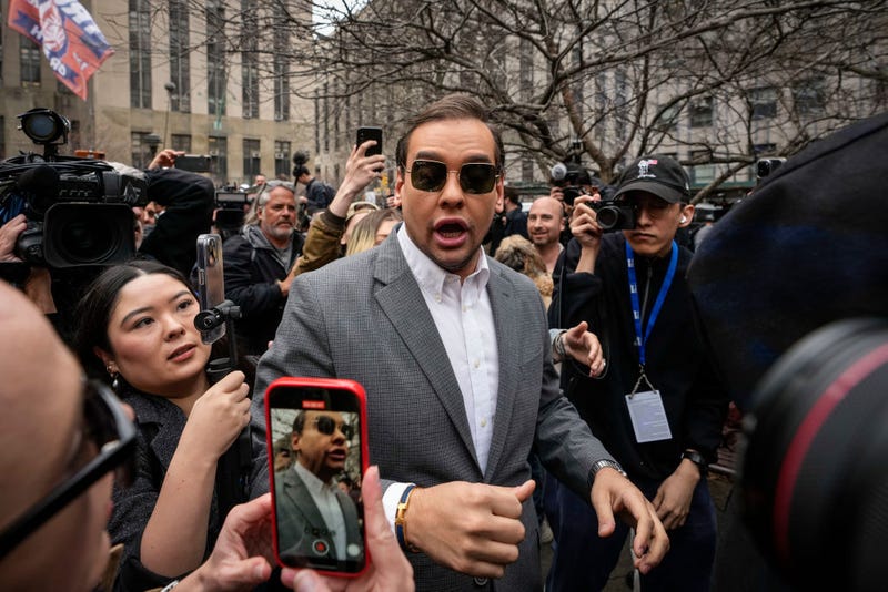 . Rep. George Santos (R-NY) walks through the crowd gathered outside the courthouse where former U.S. President Donald Trump will arrive later in the day for his arraignment on April 4, 2023 in New York City.