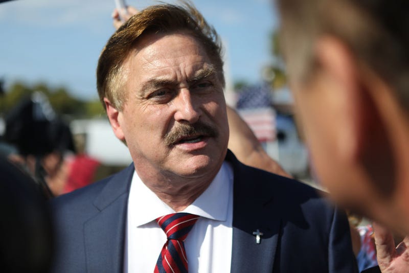 MyPillow Guy CEO Mike Lindell arrives at a gathering of supporters of former U.S. President Donald Trump near Trump's residence at the Mar-a-Lago Club on April 4, 2023 in West Palm Florida.