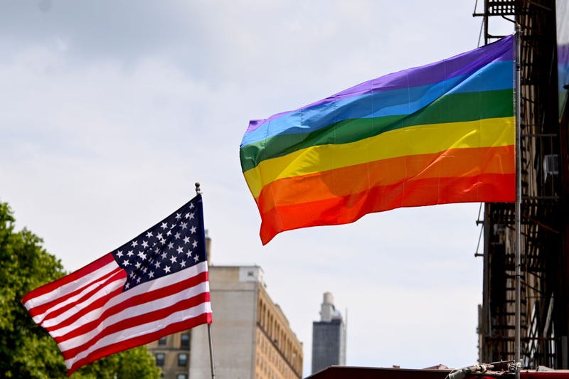  An American Flag and Pride Flag are seen flown in Chelsea on June 20, 2020 in New York City. Due to the ongoing Coronavirus pandemic, this year's march had to be canceled over health concerns.