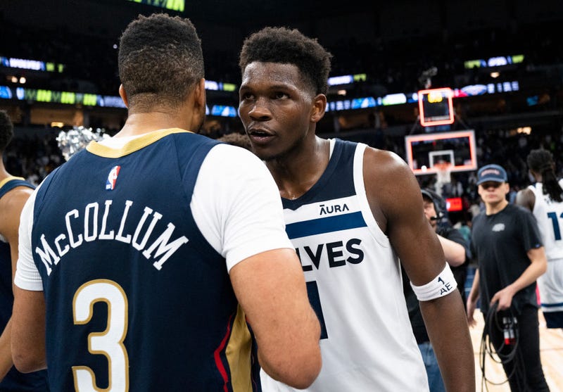 Anthony Edwards #1 of the Minnesota Timberwolves greets CJ McCollum #3 of the New Orleans Pelicans after the game at Target Center on April 9, 2023 in Minneapolis, Minnesota. The Timberwolves won 113-108.