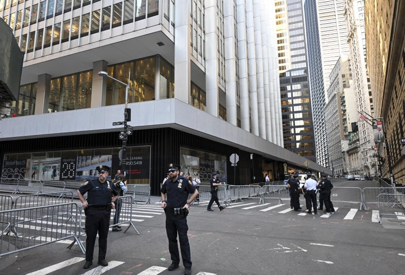 Police guard the New York attorney general's office ahead of Trump's visit on April 13, 2023