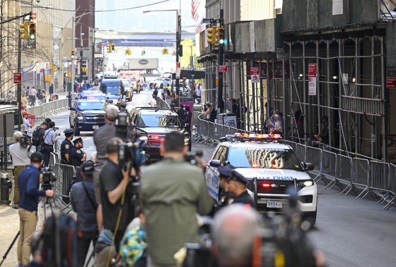 Trump's motorcade drives through Lower Manhattan to the attorney general's office on April 13, 2023