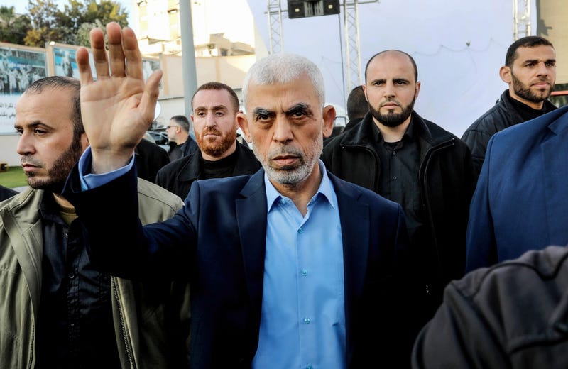 Yahya Sinwar, head of the Palestinian Islamic movement Hamas in the Gaza Strip, waves his hand to the crowd during the celebration of International Quds Day in Gaza City.