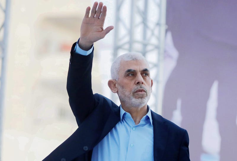 Yahya Sinwar, head of Hamas in Gaza, waves his hand to the crowd during International Quds Day in Gaza City on April 14, 2023. 