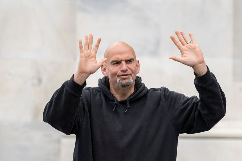 U.S. Sen. John Fetterman (D-PA) waves to reporters as he arrives at the U.S. Capitol on April 17, 2023 in Washington, DC. Fetterman is returning to the Senate following six weeks of treatment for clinical depression. (Photo by Drew Angerer/Getty Images)