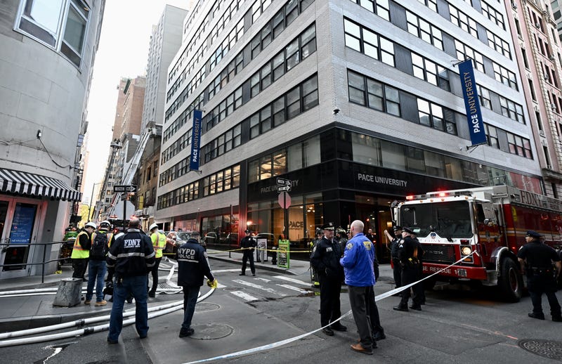 Police take security measures around the partially collapsed parking garage in Manhattan on April 18, 2023