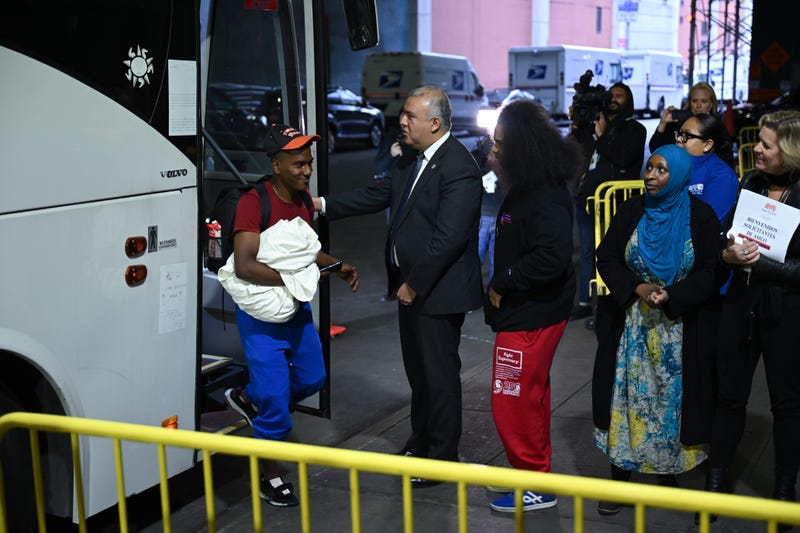 A bus carrying the migrants from Texas arrives at the Port Authority bus terminal in Manhattan on May 3, 2023