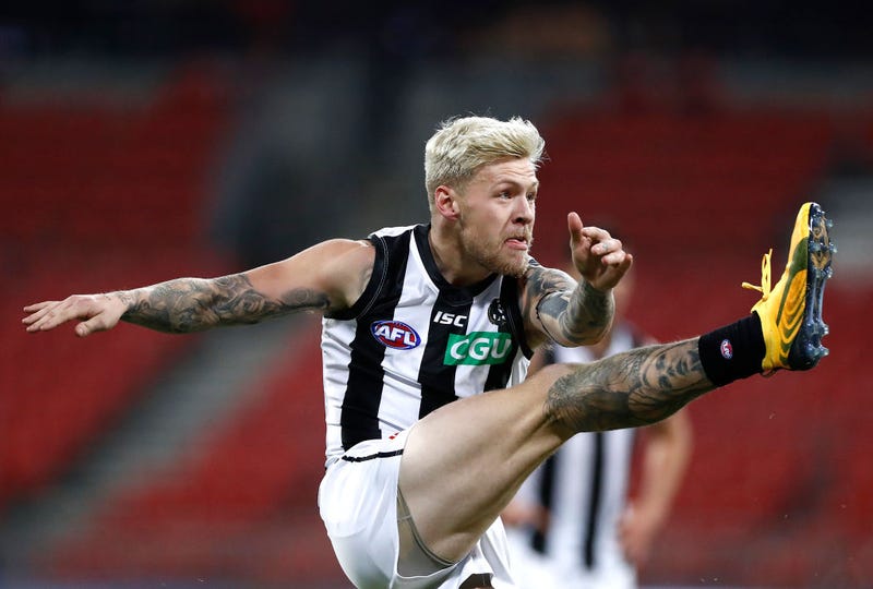 Jordan De Goey of the Magpies kicks during the round 4 AFL match between Greater Western Sydney Giants and Collingwood Magpies at GIANTS Stadium on June 26, 2020 in Sydney, Australia. 