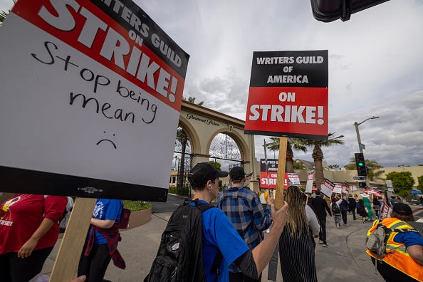 People picket outside of Paramount Pictures studios during the Hollywood writers strike on May 4, 2023 in Los Angeles, California.