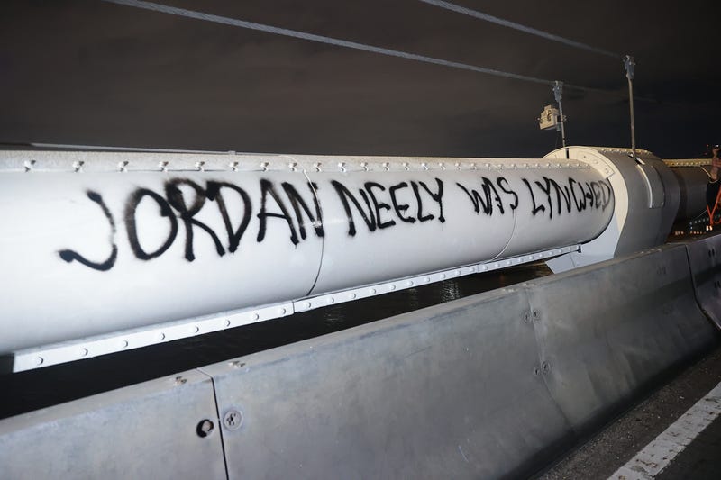 The words "Jordan Neely was lynched" are seen spray-painted on the Manhattan Bridge as protesters crossed the bridge on on May 4, 2023