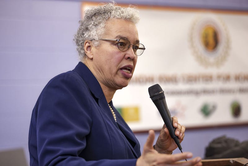 Cook County Board President Toni Preckwinkle speaking with microphone
