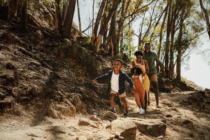 family goes on nature walk