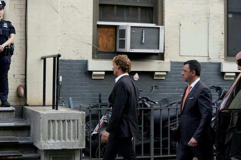 Daniel Penny (C), arrives at the 5th Precinct in Manhattan on May 12, 2023