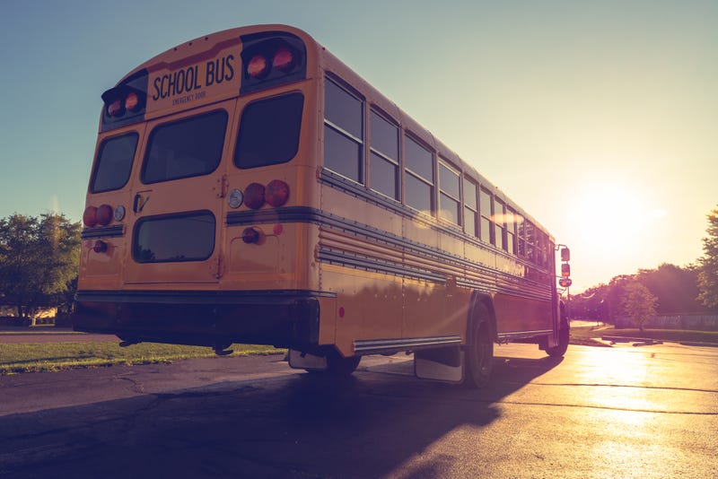 School bus driving away