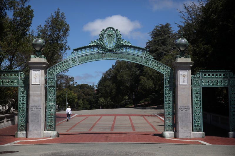 A lone pedestrian walks by Sather Gate on the U.C. Berkeley campus on July 22, 2020 in Berkeley, California.