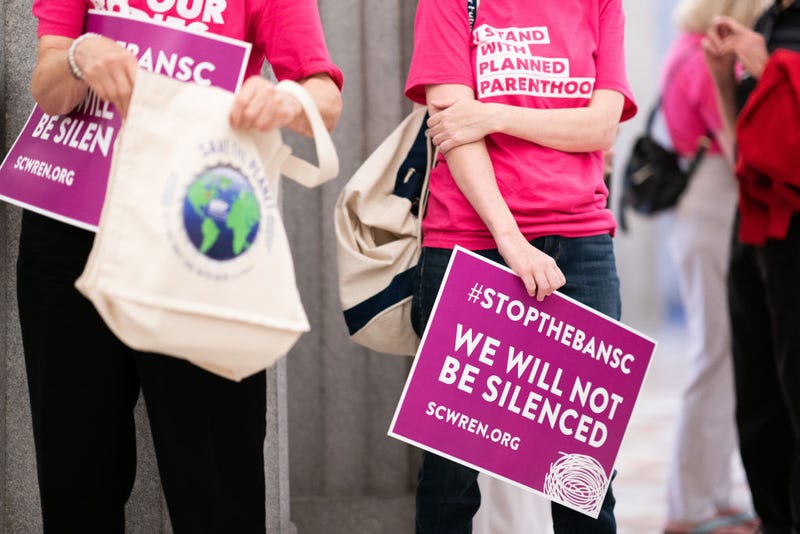 Demonstrators wait for lawmakers to arrive before the South Carolina Senate passed a ban on abortion after six weeks of pregnancy at the South Carolina Statehouse on May 23, 2023 in Columbia, South Carolina. A bi-partisan group of five women led a filibuster that failed to block the legislation. (Photo by Sean Rayford/Getty Images)