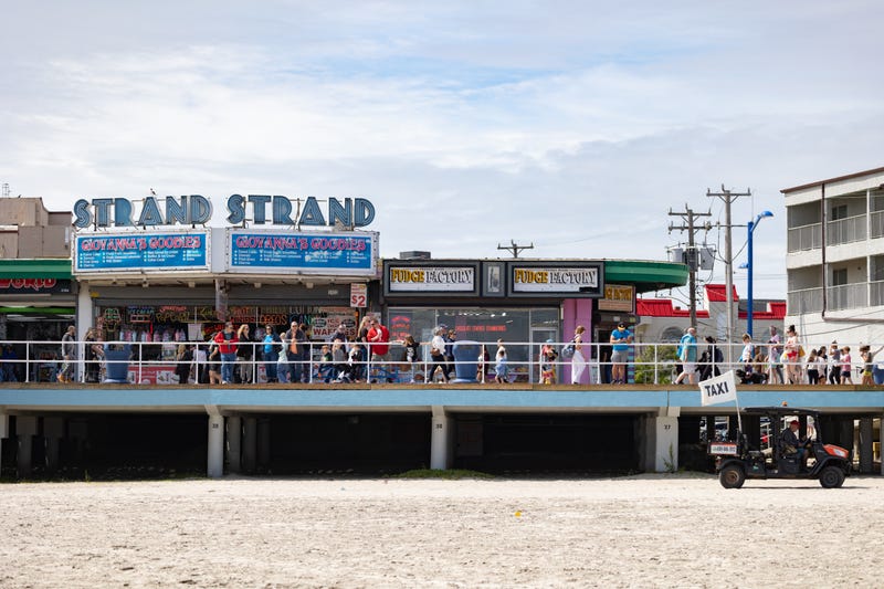 People spend time on the boardwalk during the Memorial Day weekend on May 28, 2023, in Wildwood, New Jersey.