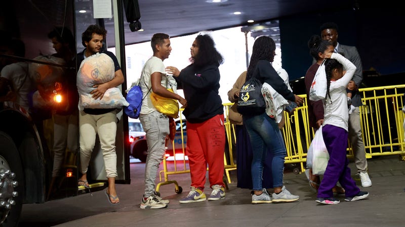 Migrants arrive from Texas at the Port Authority Bus Terminal on May 17, 2023