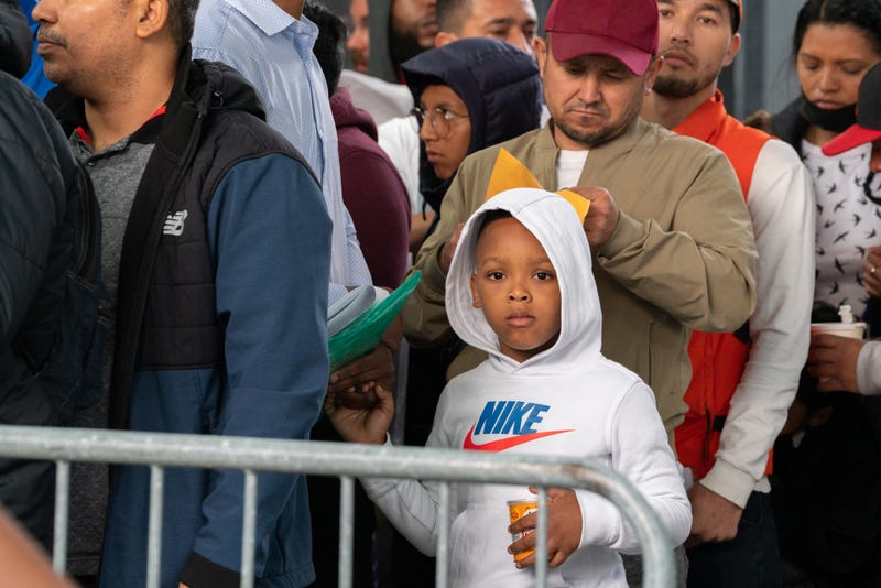 Hundreds of asylum seekers line up outside of the Jacob K. Javits Federal Building on June 6, 2023 in New York City.