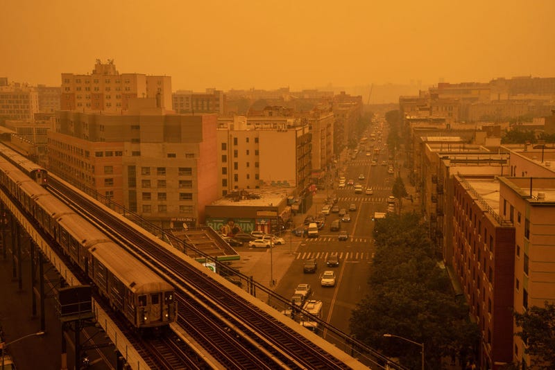 : Smoky haze from wildfires in Canada blankets a neighborhood on June 7, 2023 in the Bronx borough of New York City.