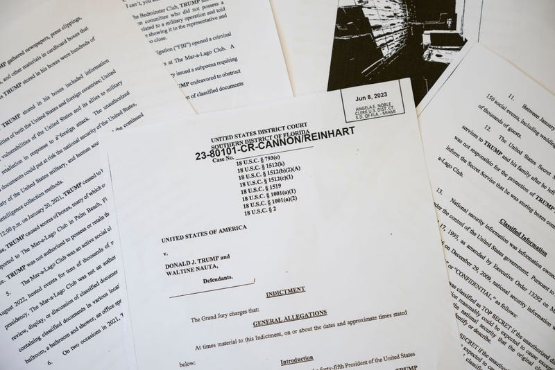 In this photo illustration, pages are viewed from the unsealed federal indictment of former U.S. President Donald Trump on June 9, 2023 in Washington, DC. Former U.S. President Donald Trump has been indicted on 37 felony counts in Special Counsel Jack Smith's classified documents probe.