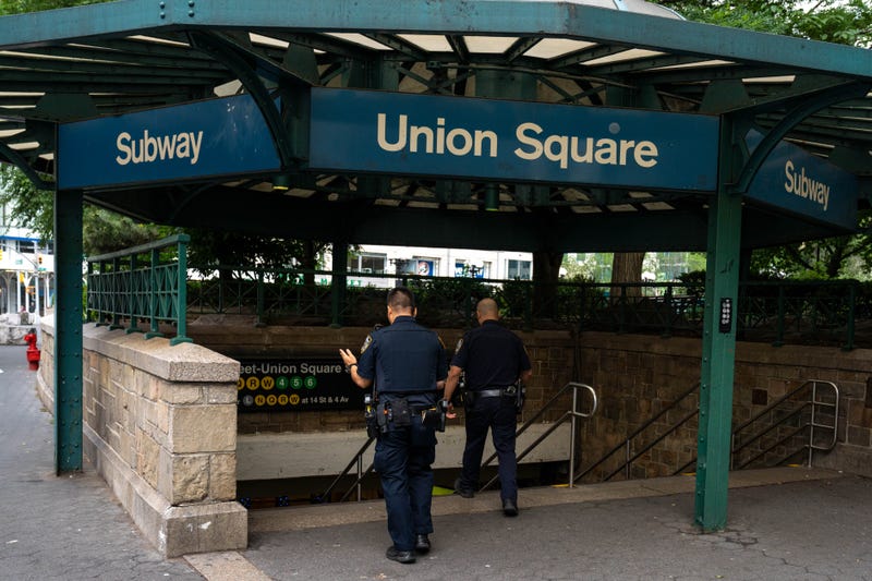 The two men got off the train at Union Square and were taken into custody