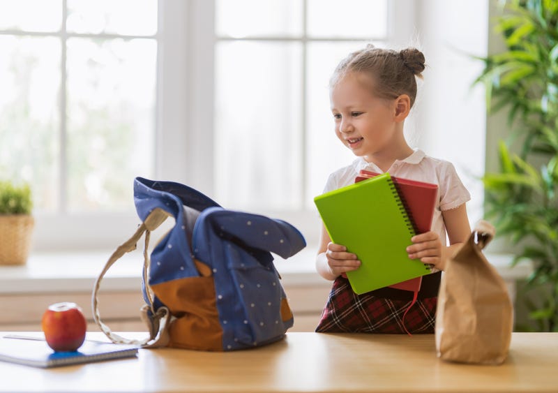 child preparing for school 