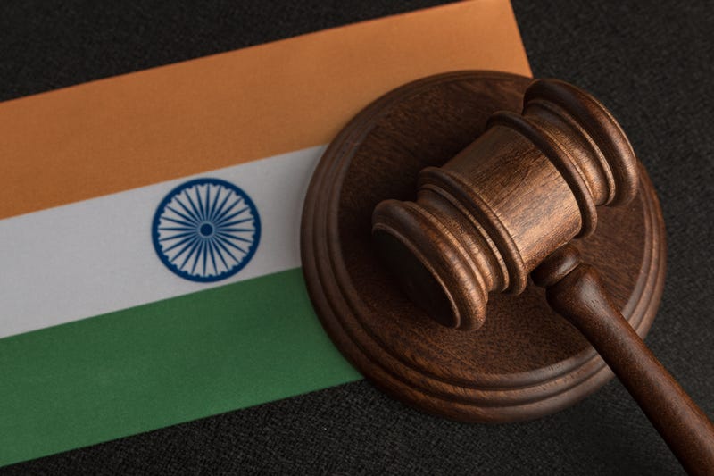 Gavel and Indian flag stock photo.