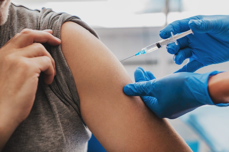 Vaccine booster stock photo. 