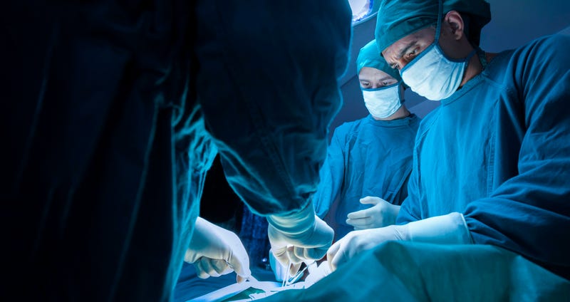 Doctors in surgery.