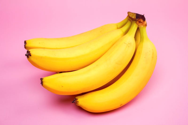 Bananas against pink background