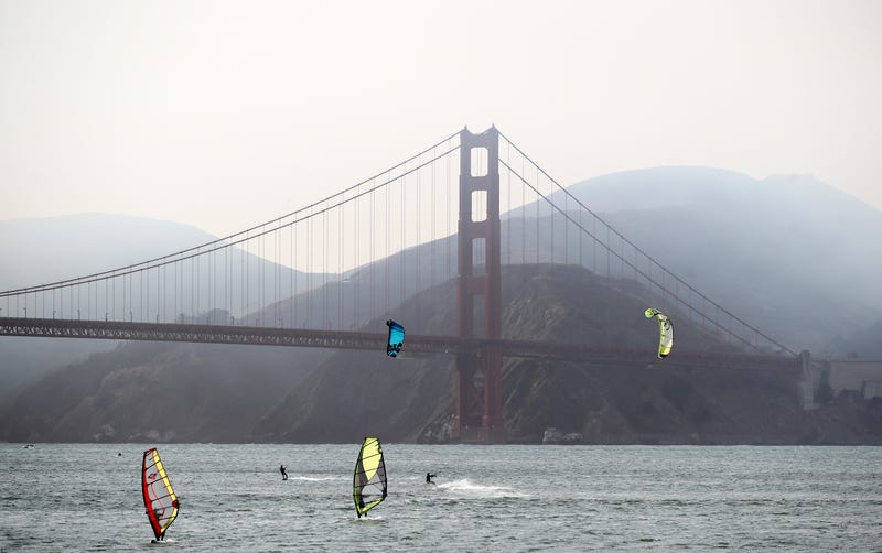 Kiteboarders and windsurfers enjoy the strong winds near the Golden Gate Bridge even with heavy smoke from the nearby wild fires on August 20, 2020 in San Francisco, California.
