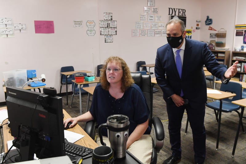Clark County School Superintendent Jesus Jara watches a teacher do distance learning