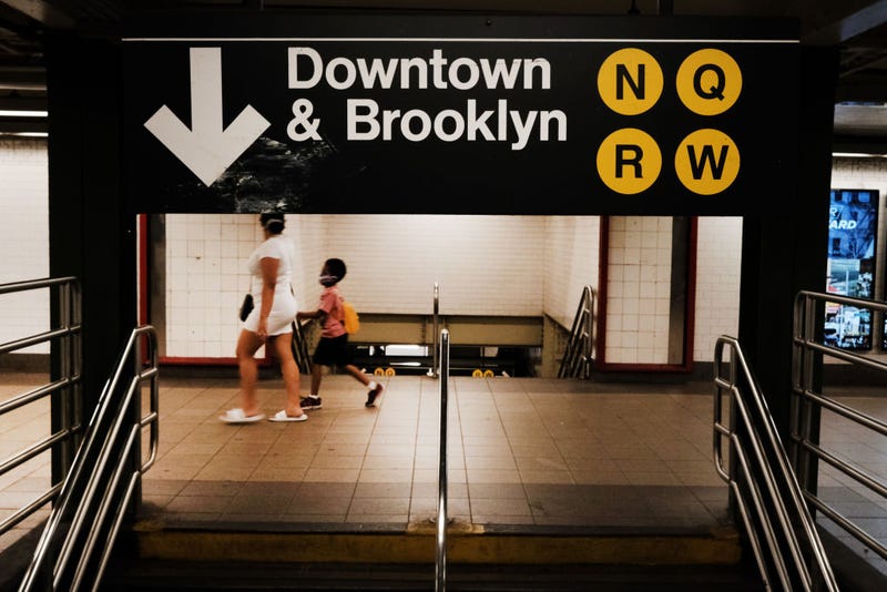 People walk through a nearly empty Manhattan subway station on August 26, 2020 in New York City.People walk through a nearly empty Manhattan subway station on August 26, 2020 in New York City.