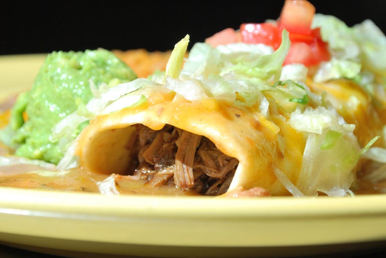 Smothered burrito on plate