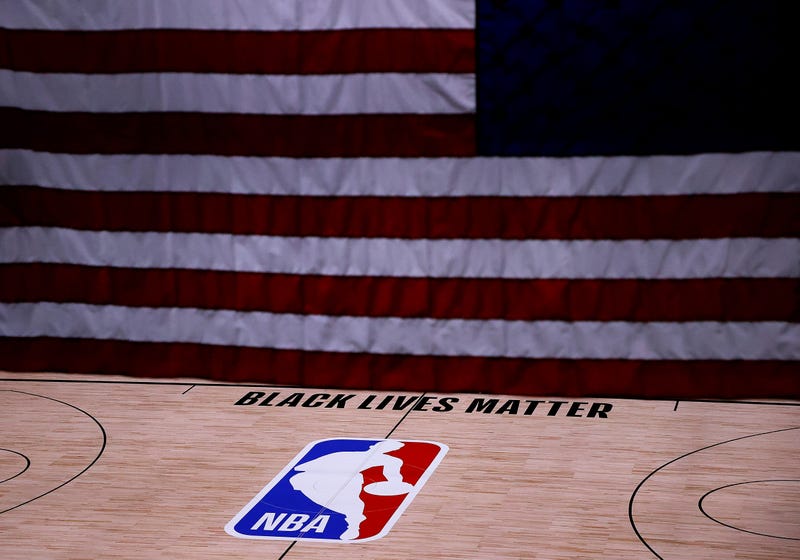 LAKE BUENA VISTA, FLORIDA - AUGUST 27: The Black Lives Matter logo is seen on an empty court as all NBA playoff games were postponed today during the 2020 NBA Playoffs at The Field House at ESPN Wide World Of Sports Complex on August 27, 2020 in Lake Buena Vista, Florida. NBA players have reportedly decided to resume the season after their walkout of playoff games on Wednesday to protest the shooting of Jacob Blake in Kenosha, Wisconsin.