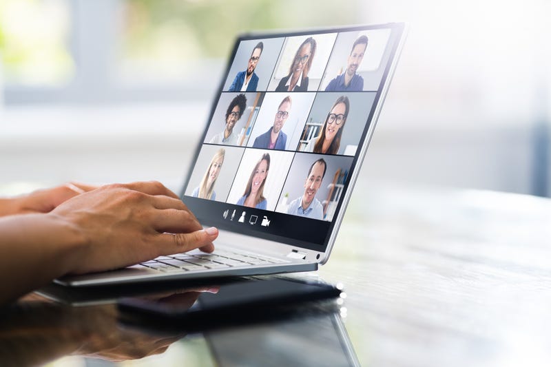 The anonymous poster allegedly spammed meeting attendees and committee members with racial slurs and pornographic imagery.