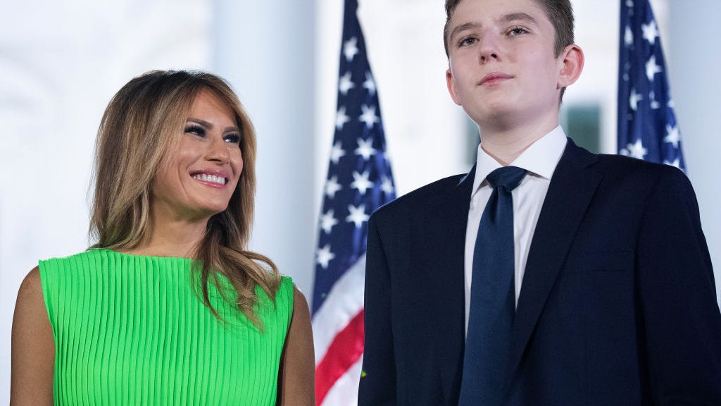 Barron Trump, after apparent growth spurt, looms large over mom Melania while carrying her Louis Vuitton bag in NYC