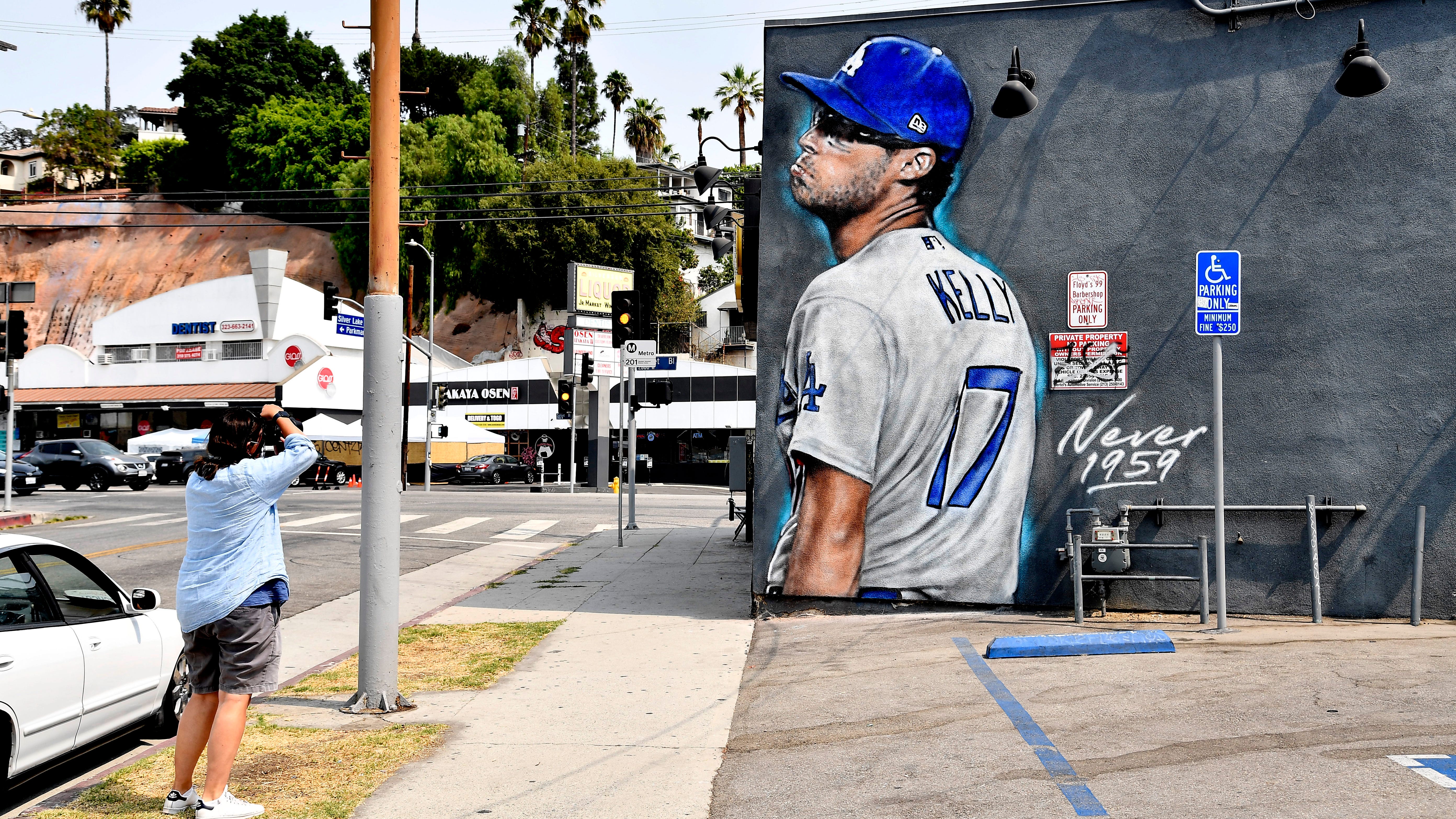 Joe Kelly Visits L.A. Mural Featuring His Famous Pouting Face