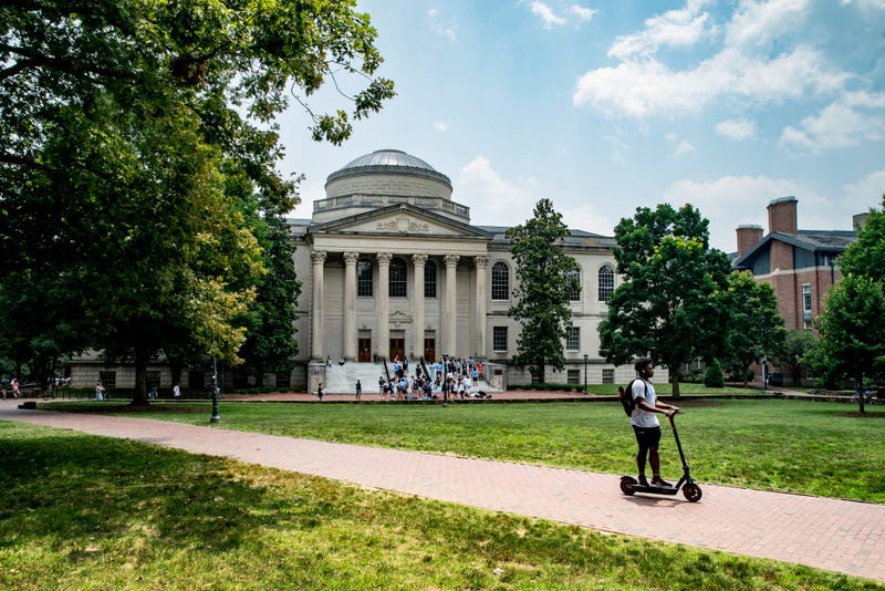 People walk on the campus of the University of North Carolina Chapel Hill on June 29, 2023 in Chapel Hill, North Carolina.