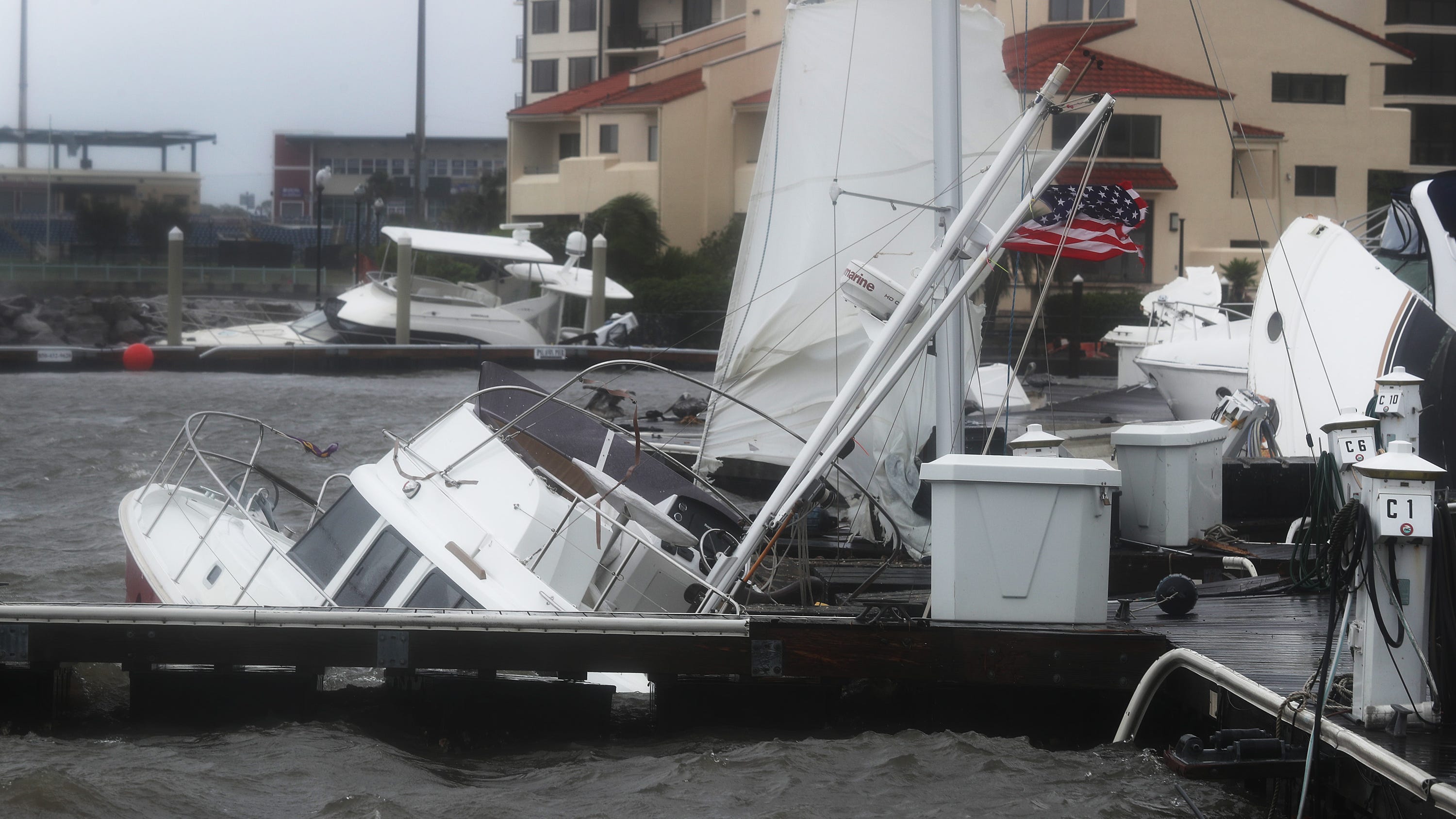 Hurricane Sally sinks boats in Pensacola yacht harbor