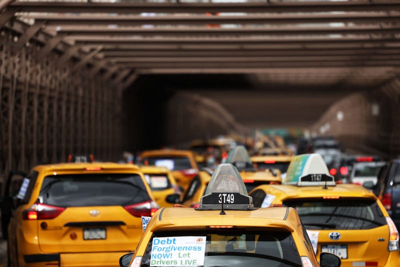 Taxi cab drivers stop traffic on the Brooklyn Bridge on September 17, 2020 in New York City. New York City taxi cab drivers held a day of action calling for debt forgiveness for loss of income amid work shortage due to the coronavirus (COVID-19) pandemic.