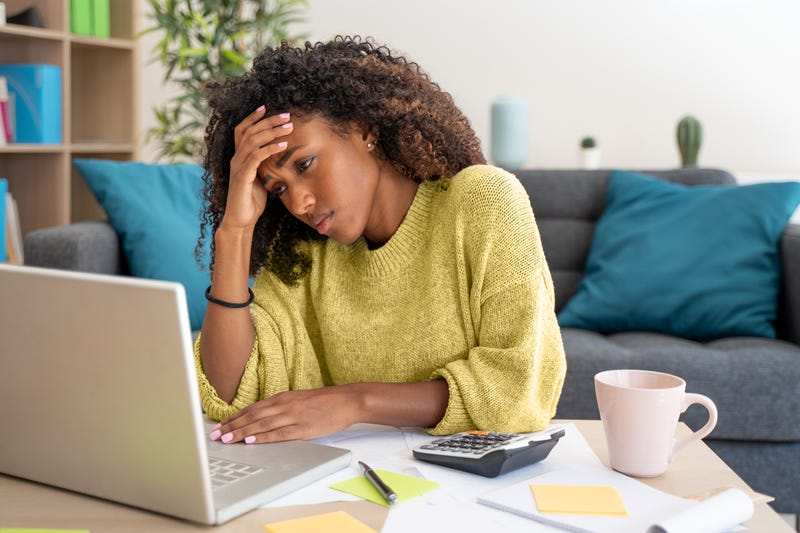 woman looking at computer