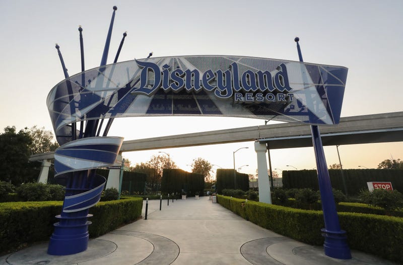 A Disneyland sign is posted at an empty entrance to Disneyland on September 30, 2020 in Anaheim, California. Disney unveiled an updated annual pass system with four different "Magic Key" levels.