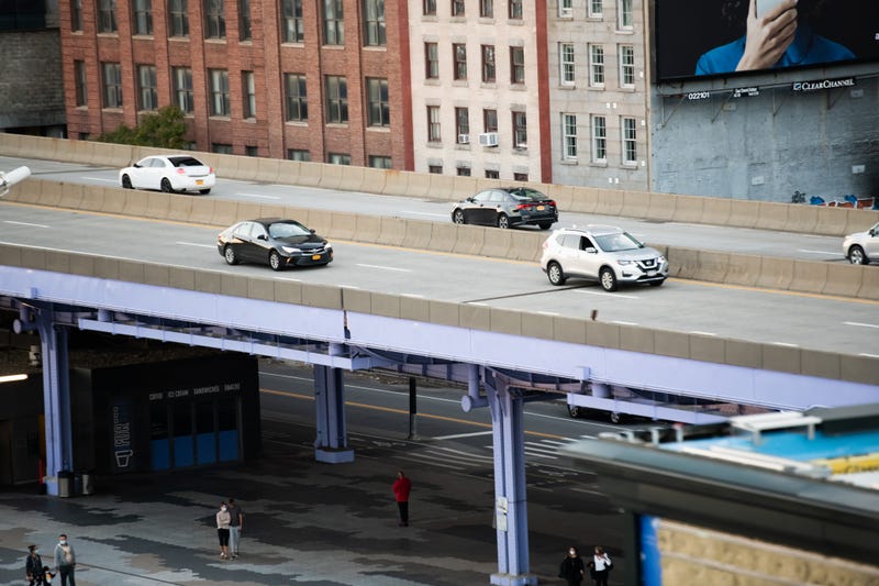 Cars are seen on the FDR Drive by the South Street Seaport in Lower Manhattan