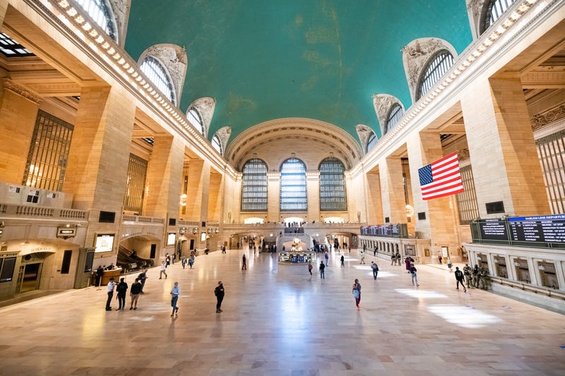 People walk inside Grand Central Terminal